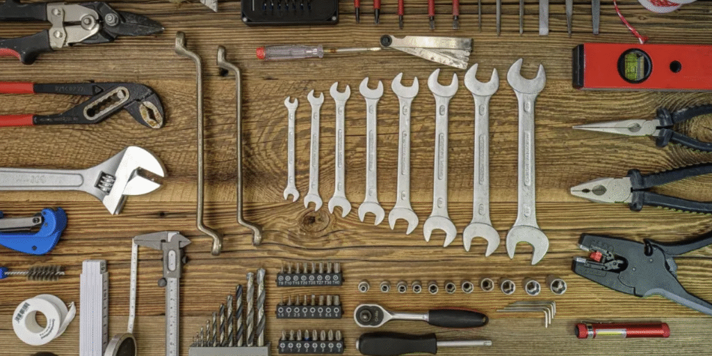 A neatly arranged set of various hand tools