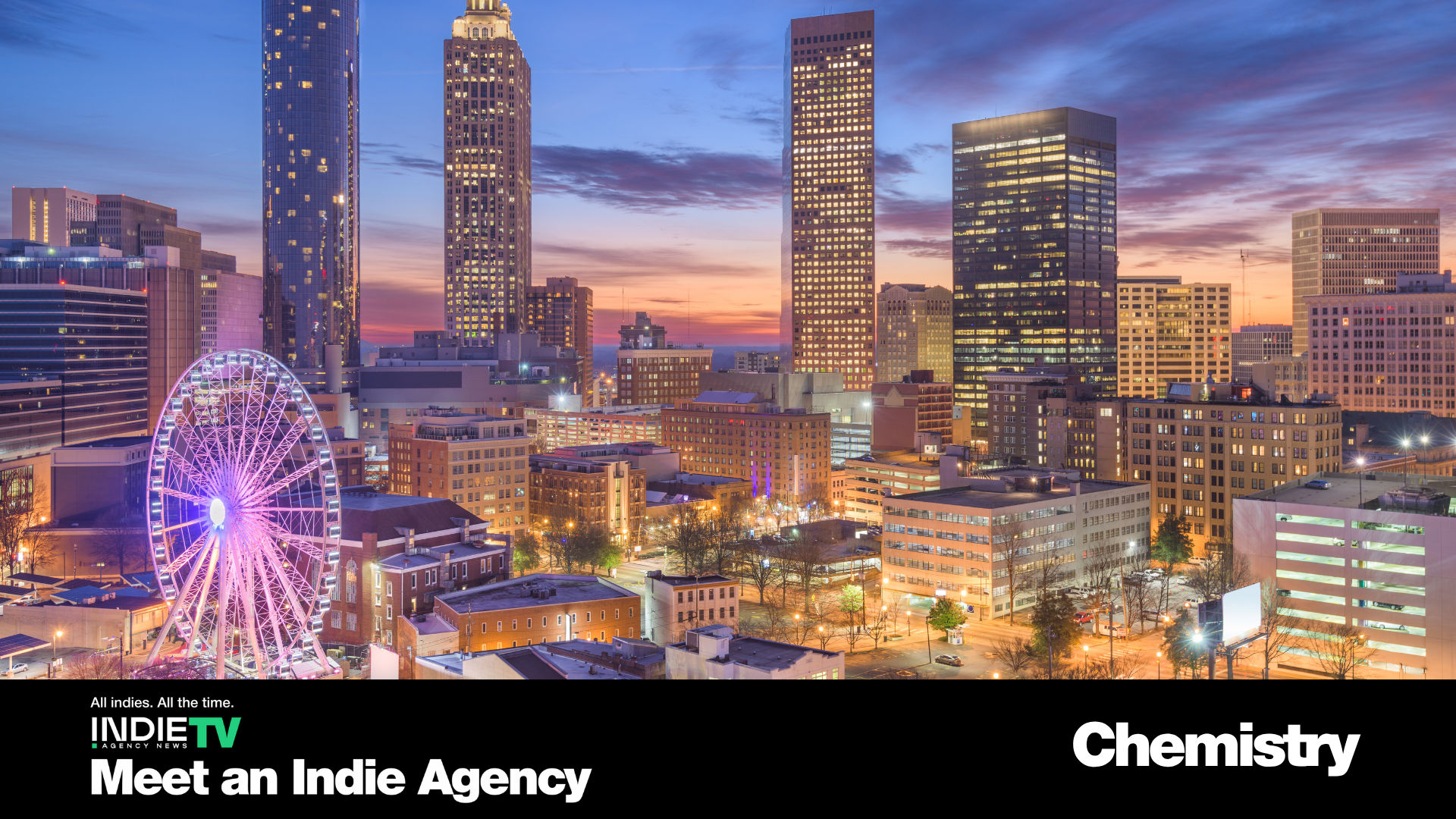A city skyline at sunset with tall buildings, a Ferris wheel, and colorful lights; text overlays promoting Indie TV and Chemistry agency.