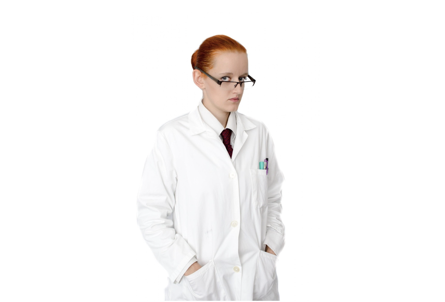 Person in a white lab coat and glasses stands with hands in pockets, looking slightly to the side against a white background—exuding the calm confidence of a true Lab Coat Trophy winner and embodying the curiosity of a devoted DevOps Rookie.