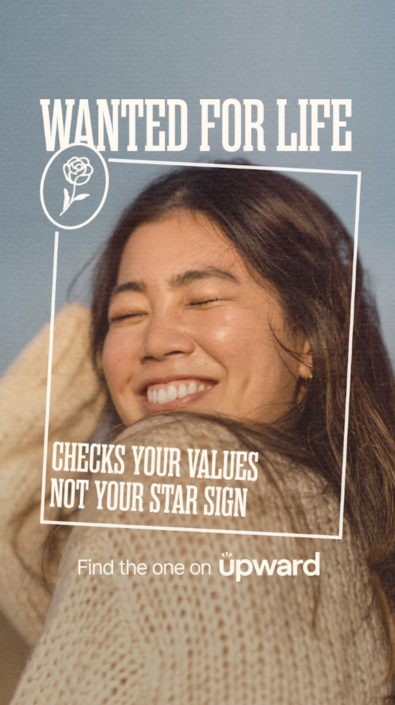 Smiling woman with long hair in sunlight, text reads WANTED FOR LIFE. Checks your values, not your star sign—true wifey material. Find the one on Upward. White rose icon included. Design by Corner Table Creative, inspired by a modern wanted poster style.